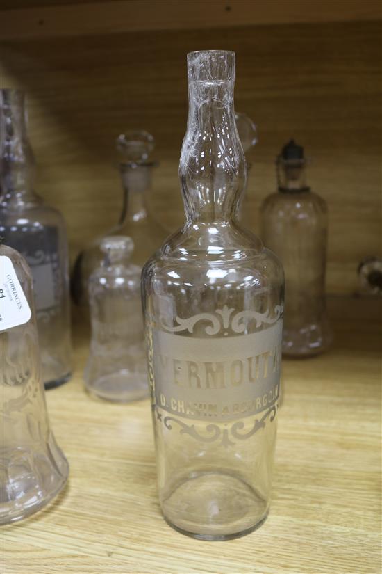 A quantity of glass decanters tallest 31cm